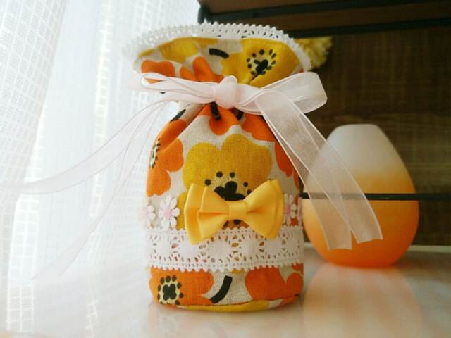 黄色のお花がかわいいきんちゃくタイプの骨壺カバー